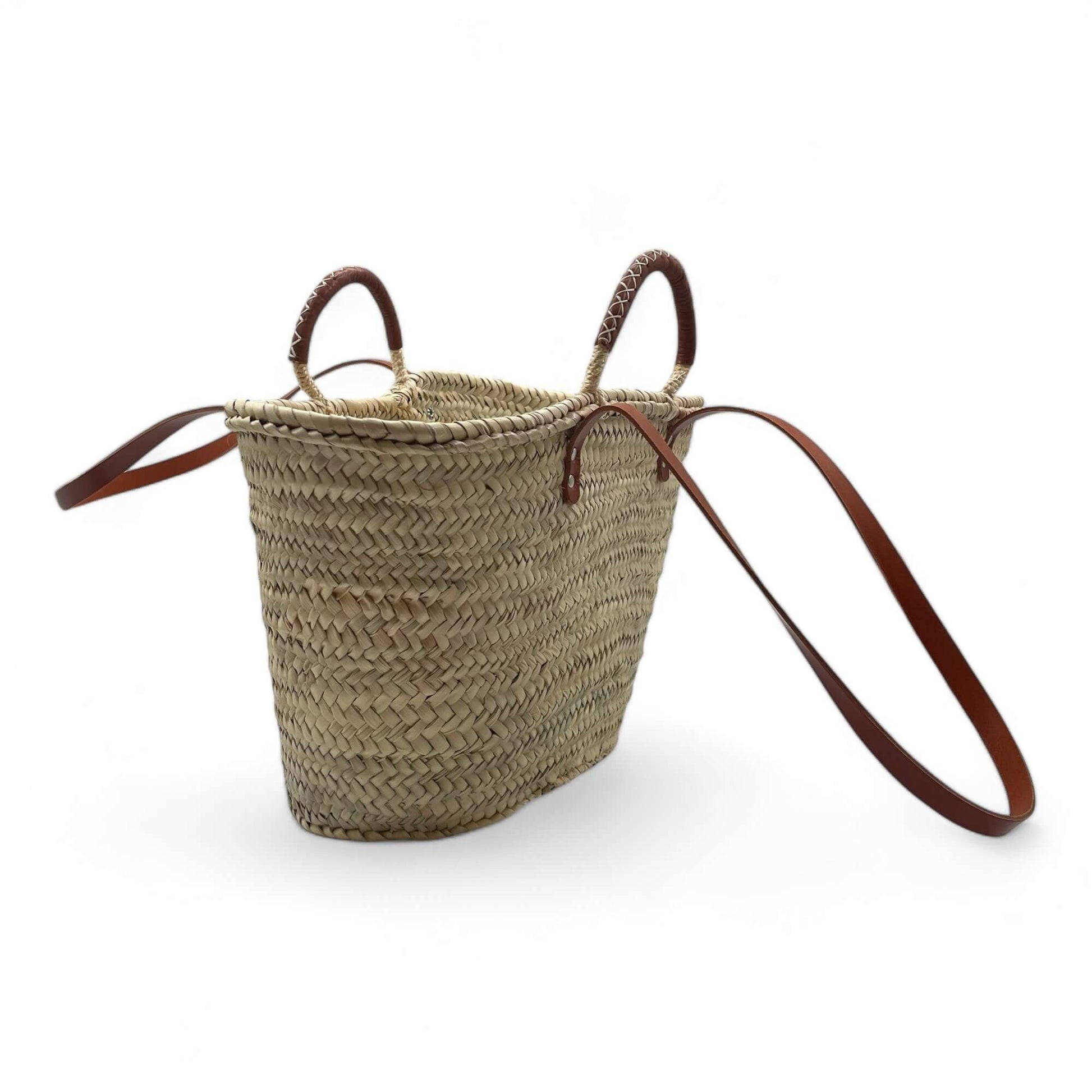 Bolso de playa de palma con doble asa de cuero, ideal para la playa y uso diario, con diseño elegante y espacioso.