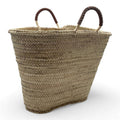 Capazo de palma con asas de cuero, ideal para la playa y uso diario, perfecto para almacenar esenciales.