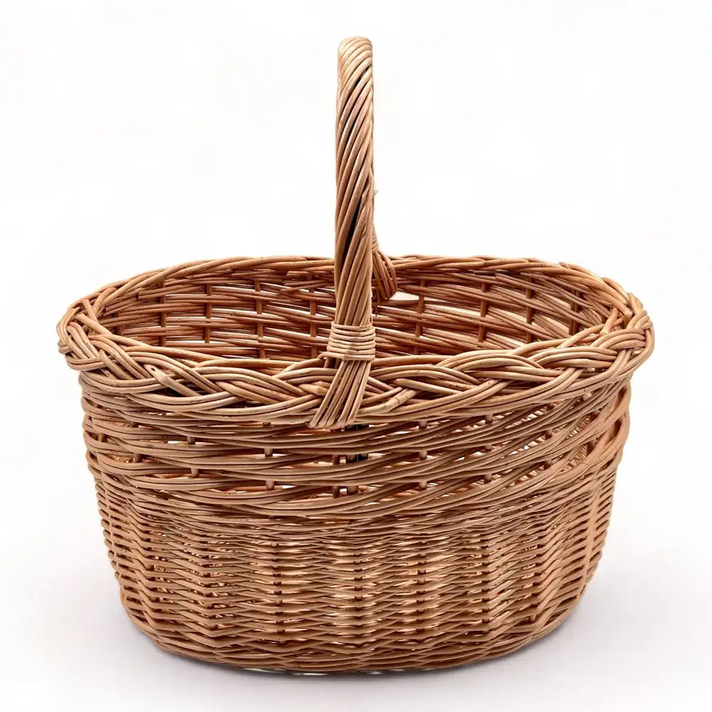 Cesta de mimbre trenzada con asa, ideal para almacenamiento y recolectar setas, tamaño mediano.