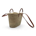 Bolso de playa de palma con doble asa de cuero, ideal para la playa y uso diario, con diseño elegante y espacioso.
